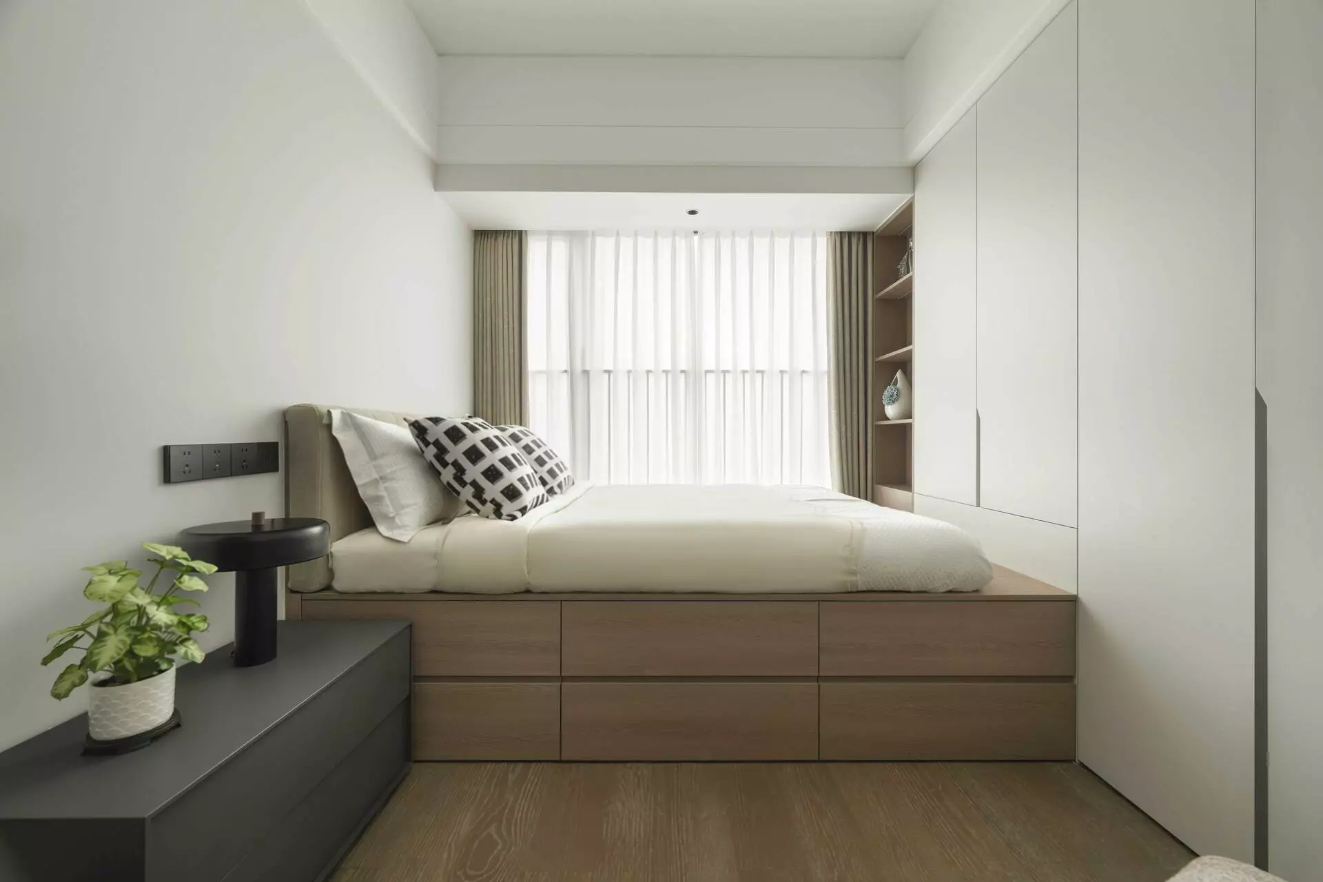 Secondary guest room layout with custom wooden accents