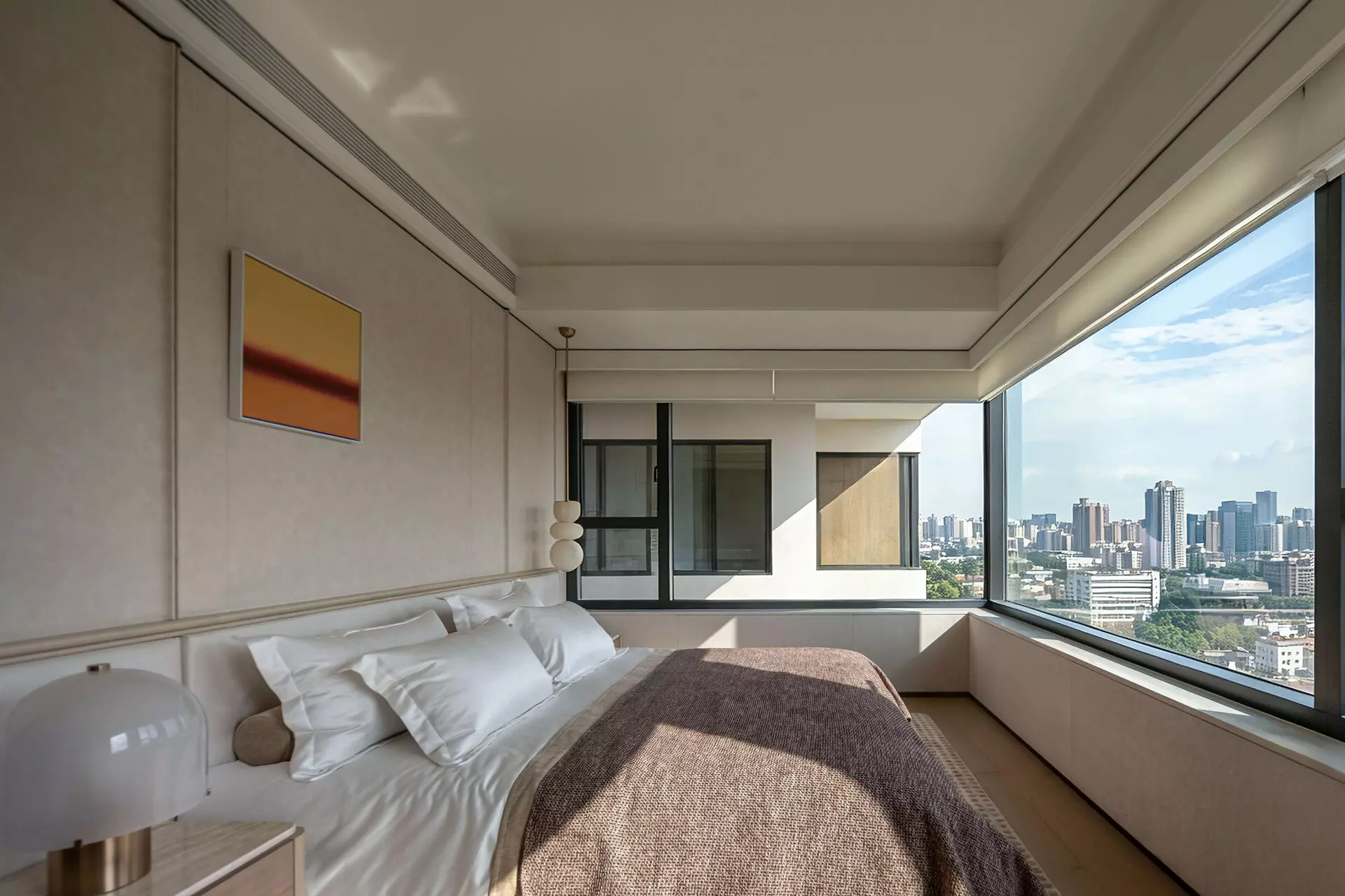 Master bedroom integrated wardrobe with warm minimalist design