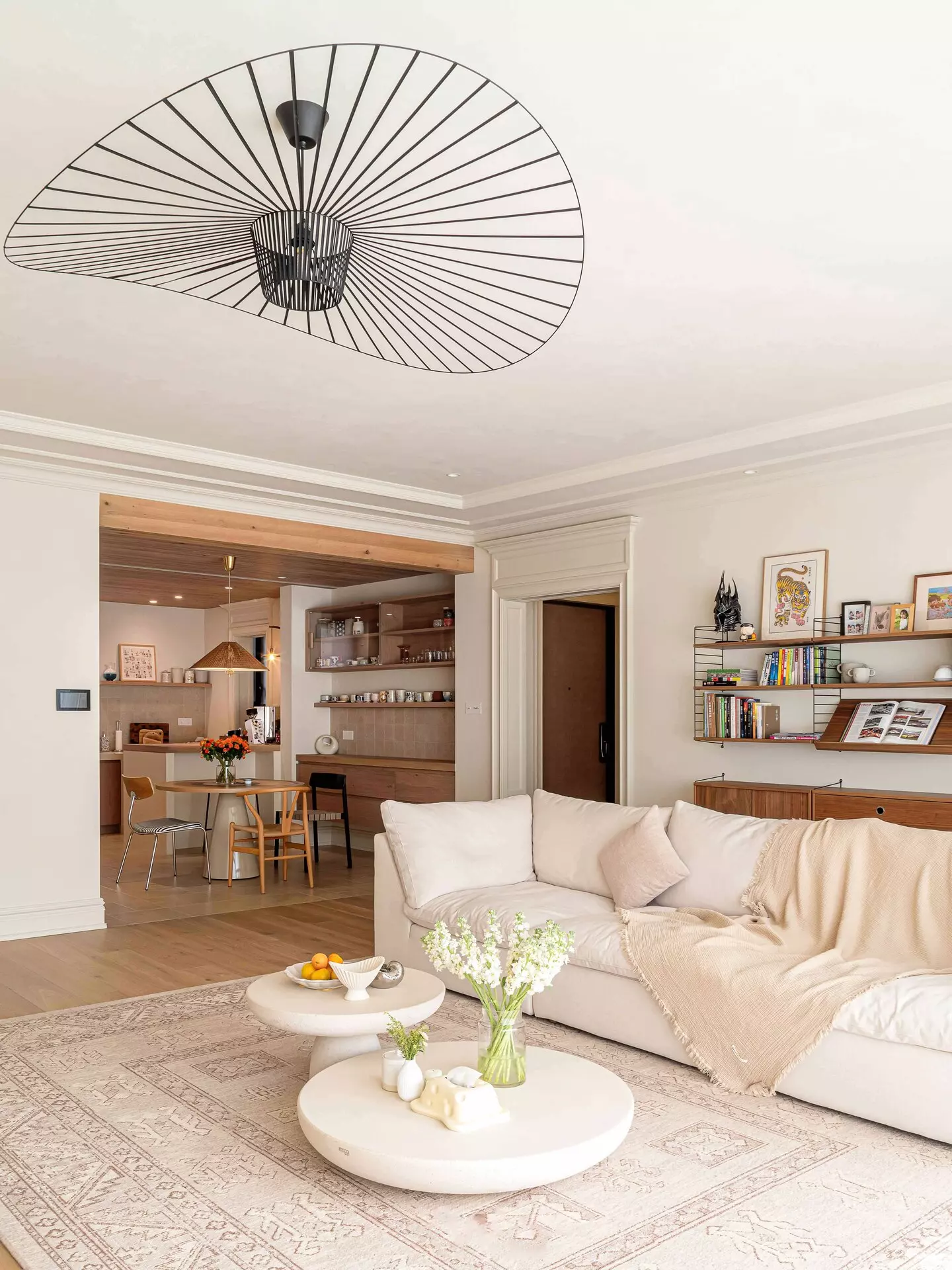 Cozy Vintage Fireplace Detail in Cream Toned DaLian Villa Living Room