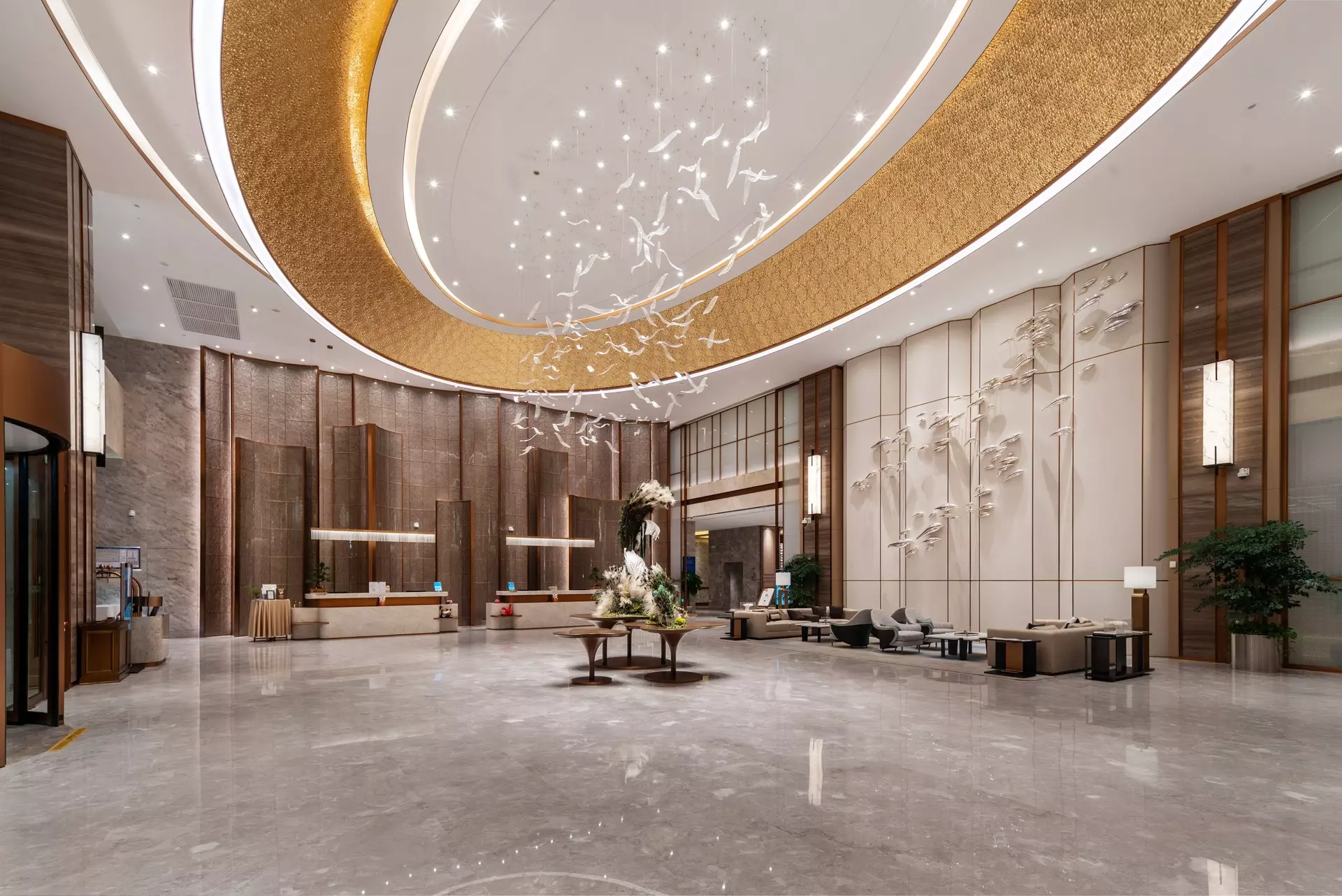 Bespoke architectural millwork and custom ceiling details in hotel public lounge