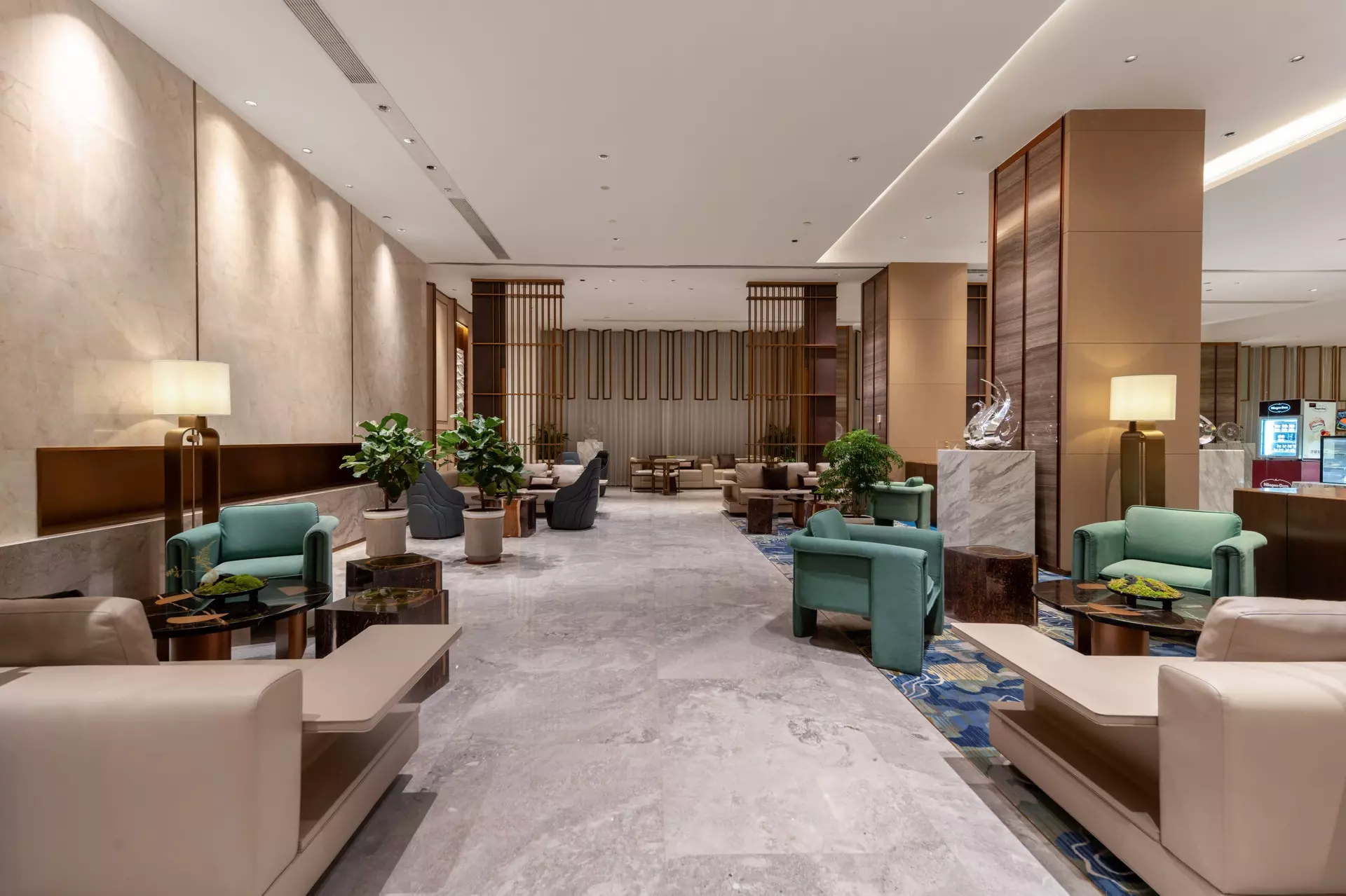 Integrated lighting and luxury wooden joinery in hotel reception corridor