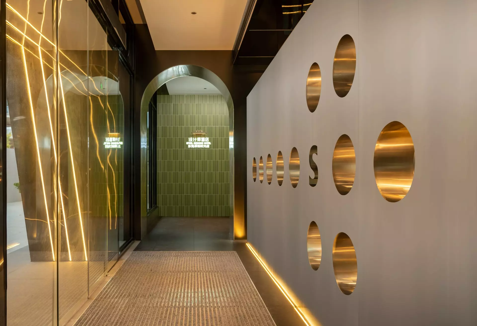 Custom architectural millwork and integrated seating in boutique hotel lobby