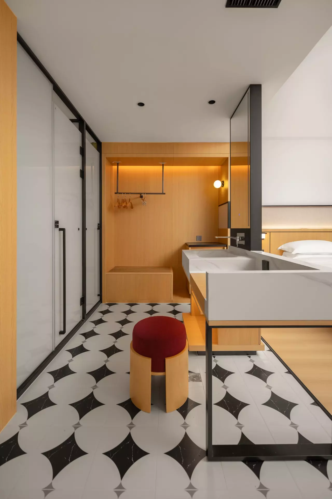 Monolithic geometric installations framing hotel public zone entries