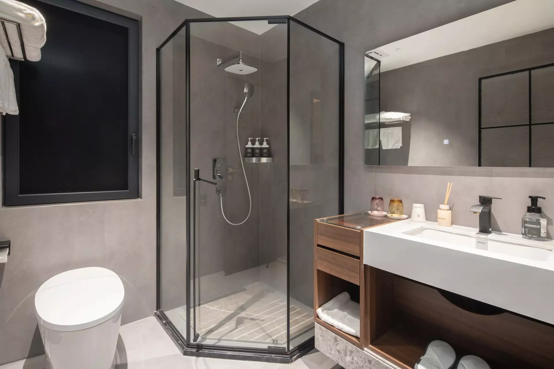 Integrated minibar cabinets and architectural timber linings in suite lounge