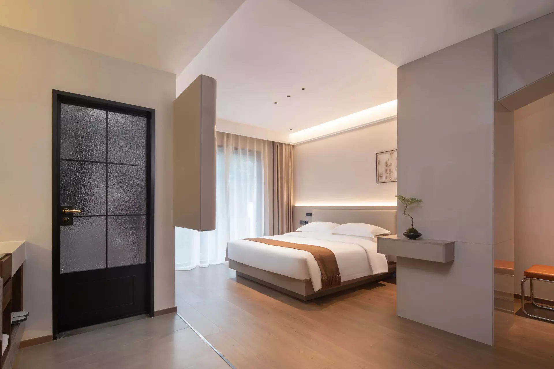 Acoustic wood panel details on executive twin room backdrop walls